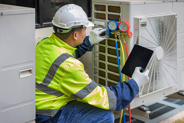 Professional Hvac technician working in Hydes, MD